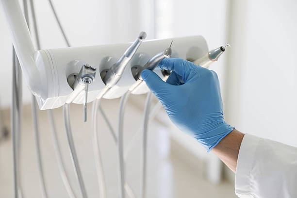 Professional Tooth Extraction technician working in Seminole County County, OK